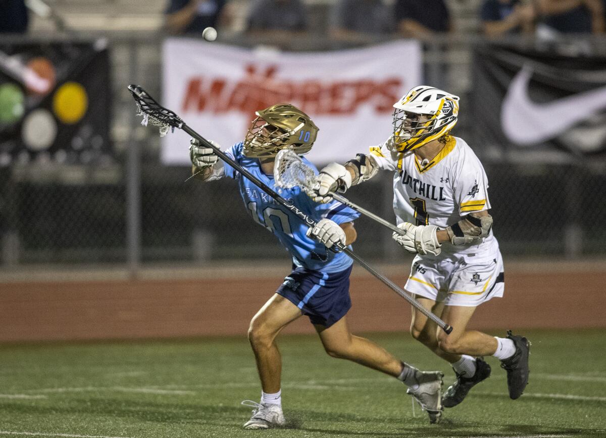 Corona del Mar's Alex Chanawatr and Foothill's Casey Copeland battle for a loose ball during the CIF Division 1 final.