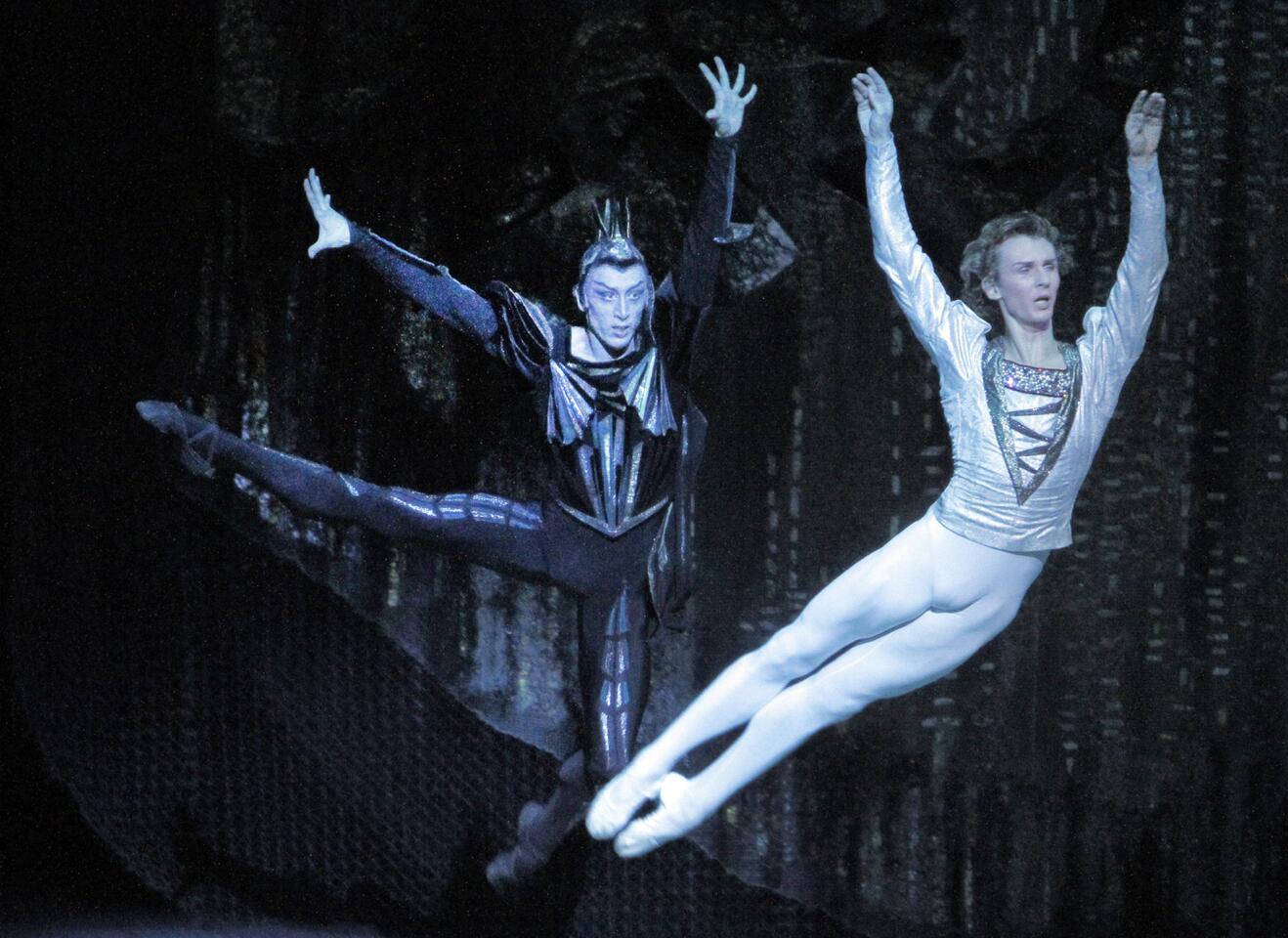 Pavel Dmitrichenko, left, as the Evil Genius, and Semyon Chudin as Prince Siegfried in the Bolshoi's "Swan Lake" at the Music Center in Los Angeles.