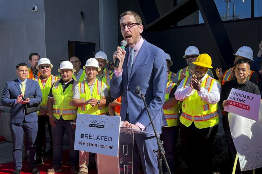 State Sen. Scott Wiener with housing advocates and members of the California Conference of Carpenters in San Francisco.