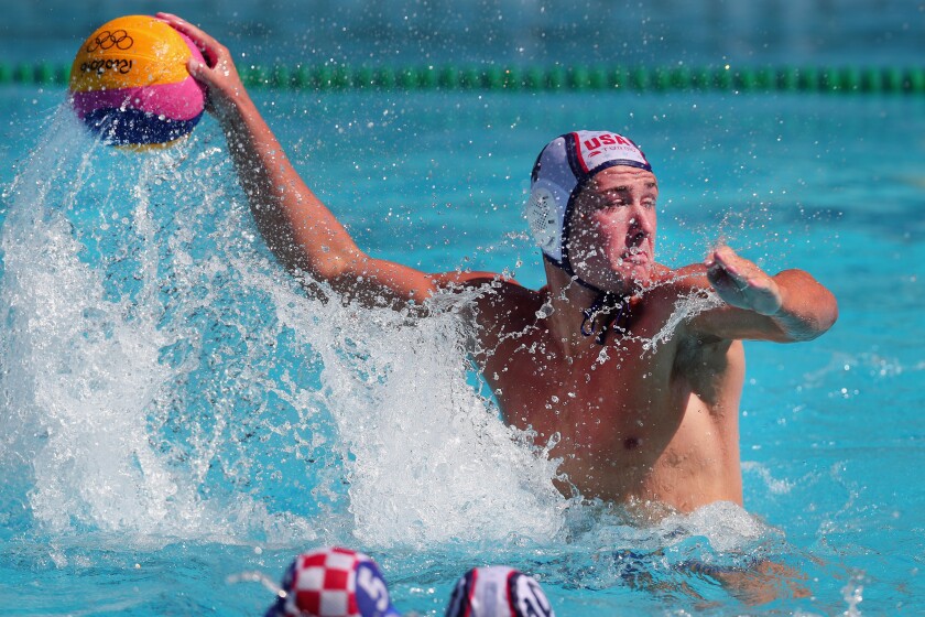 U.S. water polo center Alex Obert takes a shot against Croatia during a preliminary round match at the 2016 Summer Olympic Games in Rio de Janeiro.