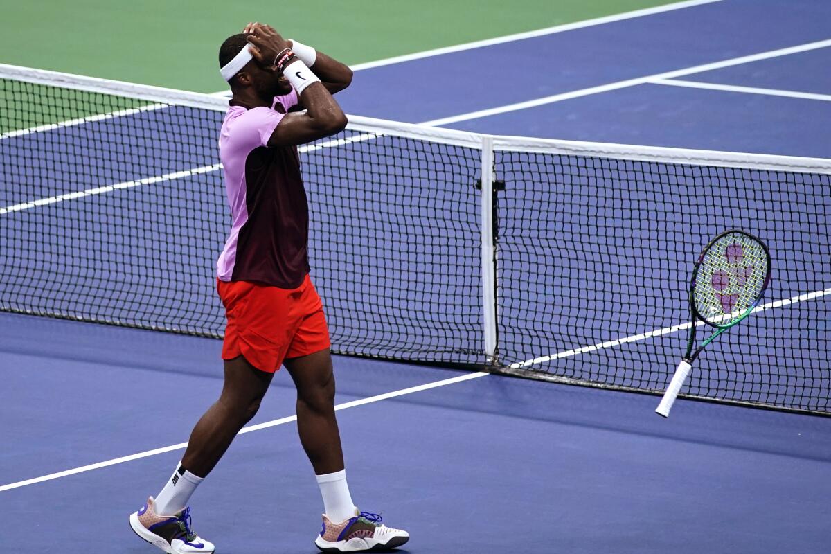 Frances Tiafoe, of the United States, celebrates after defeating Rafael Nadal, of Spain, during the fourth round of the U.S. Open tennis championships, Monday, Sept. 5, 2022, in New York. (AP Photo/Eduardo Munoz Alvarez)