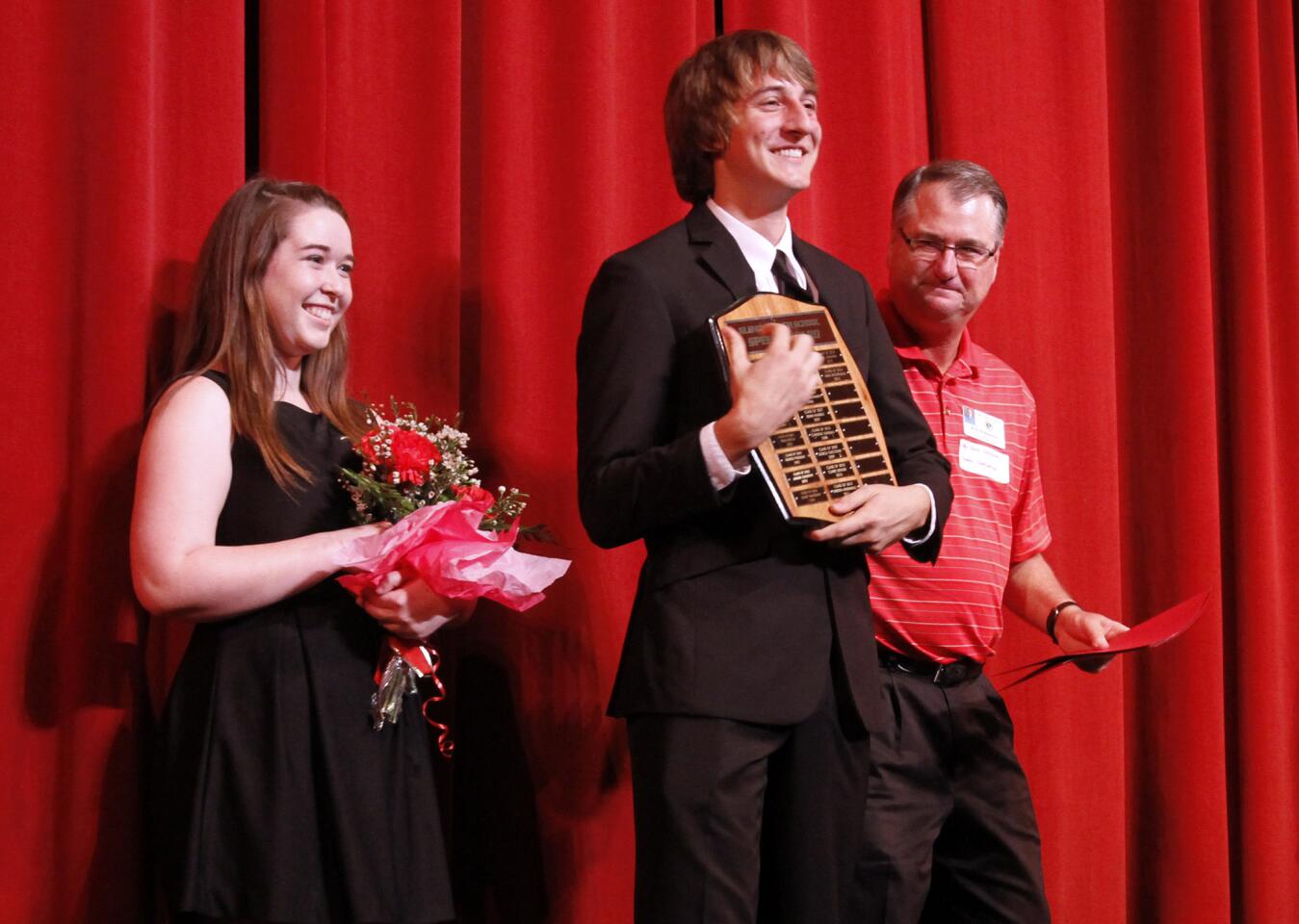 Glendale High School senior Michael Williams, center, won the speech part of the 105th annual Oratorical at the Glendale school on Friday, Feb. 28, 2014. The theme for this year was Masters of our own future.