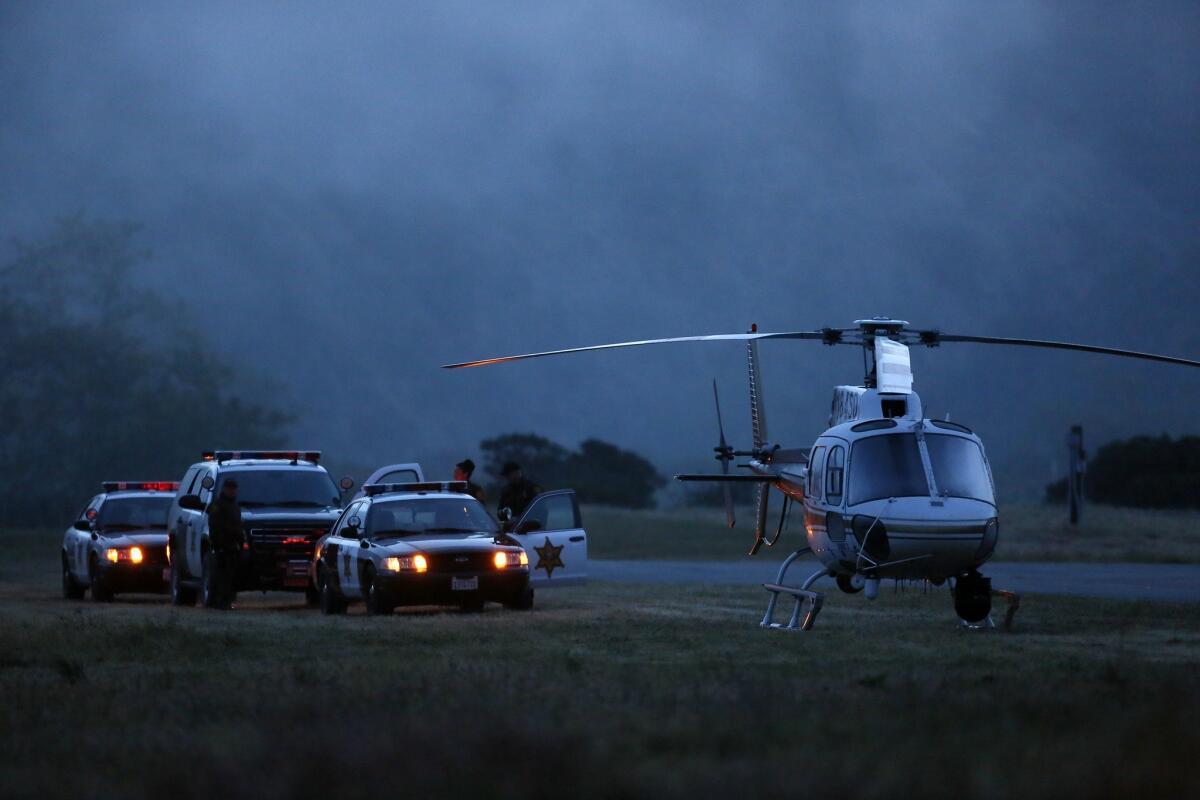 Helicopters prepare to lift off from the Trabuco Flyers Club at first light to resume the search for hiker Kyndall Jack.