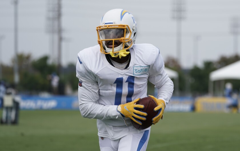 Chargers wide receiver Darius Jennings runs with the ball in practice.