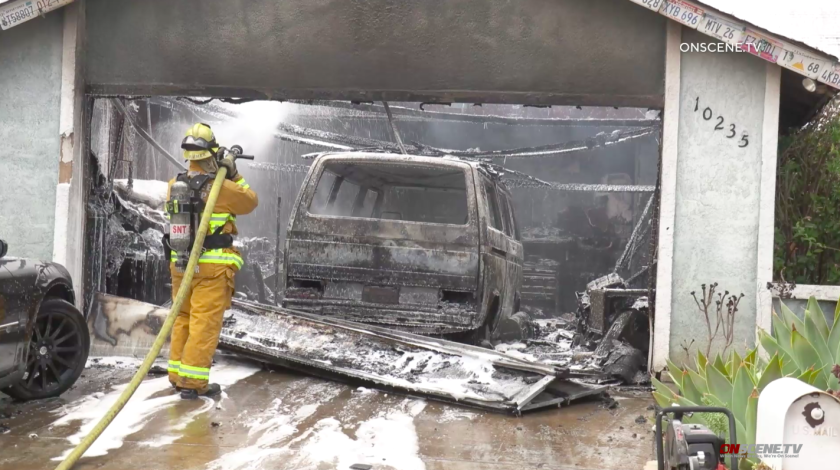 A fire in Santee charred a garage and a van on Thursday, Aug. 4.