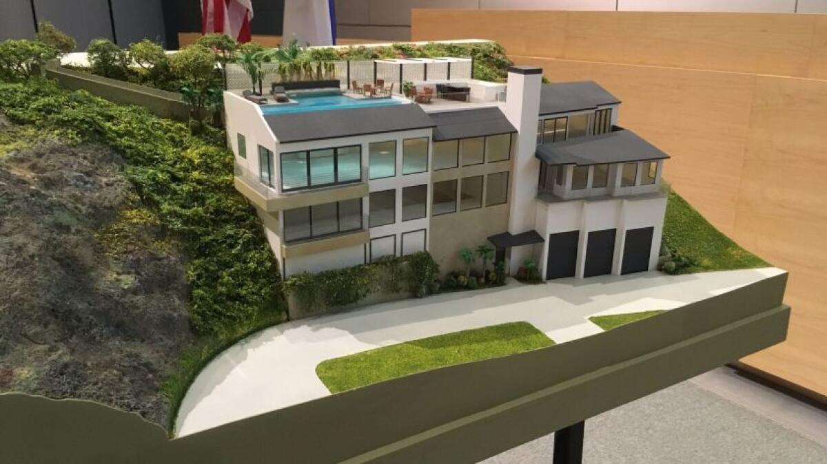 A model of the original design for 2607 Ocean Blvd. The Newport Beach Planning Commission approved a modified version of the home in 2017, but the applicant withdrew his request for a development permit as the California Coastal Commission was preparing to reject it Thursday.