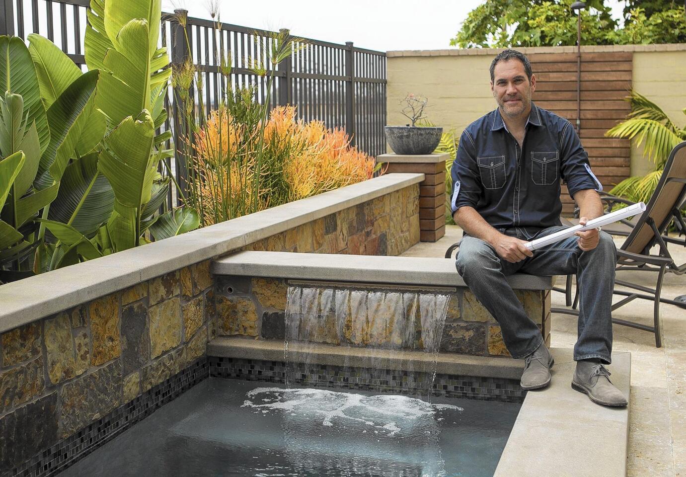 Mitch Kalamian, owner of Solena Landscape, shows off one of his latest project in Huntington Beach.