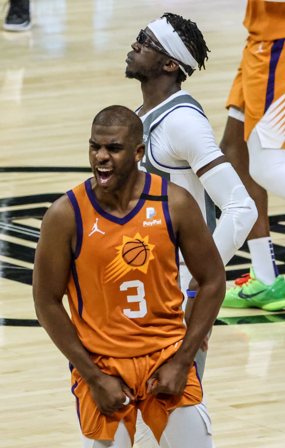 The Suns' Chris Paul celebrates an 84-80 win over the Clippers in Game 4.