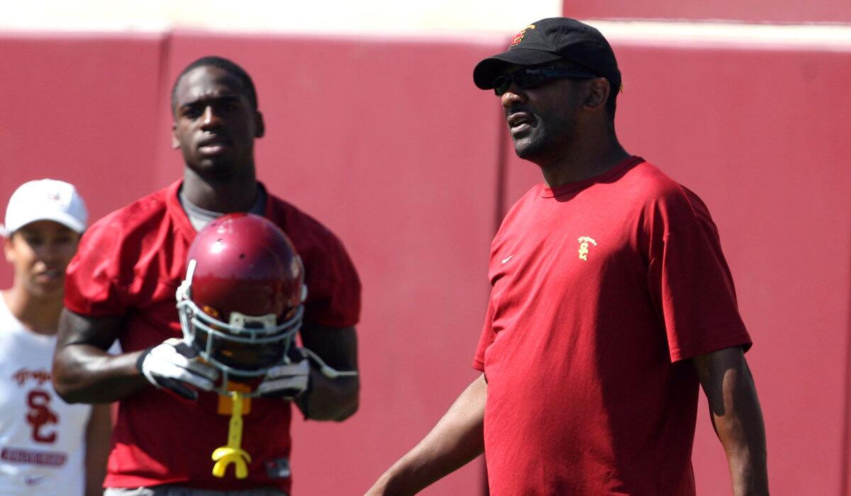 Former USC assistant coach Todd McNair, right, shown in 2009, sued the NCAA in 2011.
