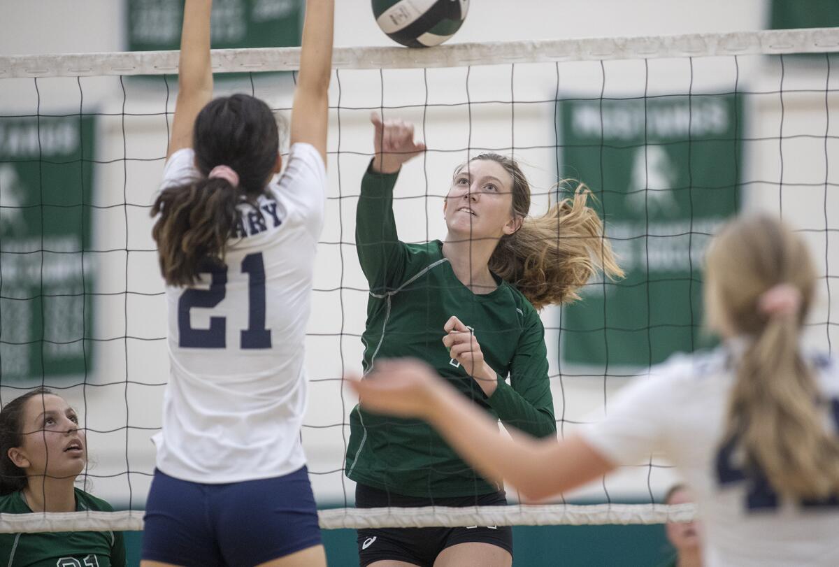 Costa Mesa's Lorelei Hobbis, shown hitting against Calvary Chapel in 2019, helped the Mustangs win on Thursday.