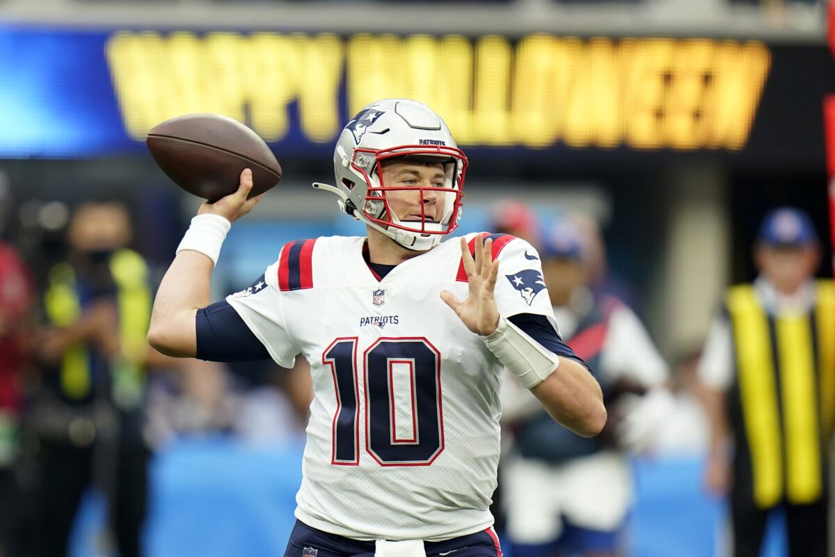 New England Patriots quarterback Mac Jones throws during the first half of an NFL football game against the Los Angeles Chargers Sunday, Oct. 31, 2021, in Inglewood, Calif. (AP Photo/Jae C. Hong)