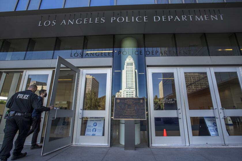 LOS ANGELES, CA - NOVEMBER 16, 2020: Photograph shows the front entrance to LAPD Headquarters on 1st St. in downtown Los Angeles. (Mel Melcon / Los Angeles Times)