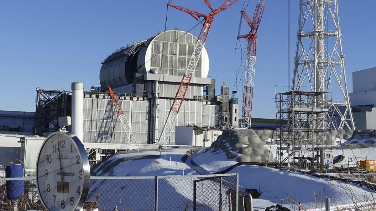 Tokyo Electric Power Co. said Monday workers started removing the first of 566 fuel units stored in the pool at Unit 3. The fuel units in the pool are not enclosed and their removal to safer ground is crucial to avoid disaster in case of another major quake.