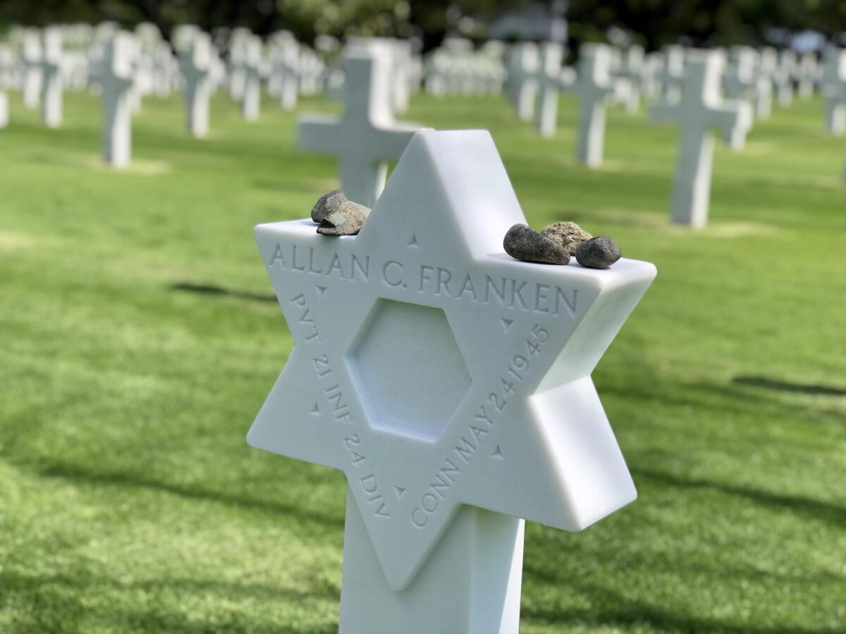 The gravestone of Pvt. Allan C. Franken, a Jewish soldier killed in World War II, was changed to a Star of David in a ceremony at the Manila American Cemetery on Feb. 12.