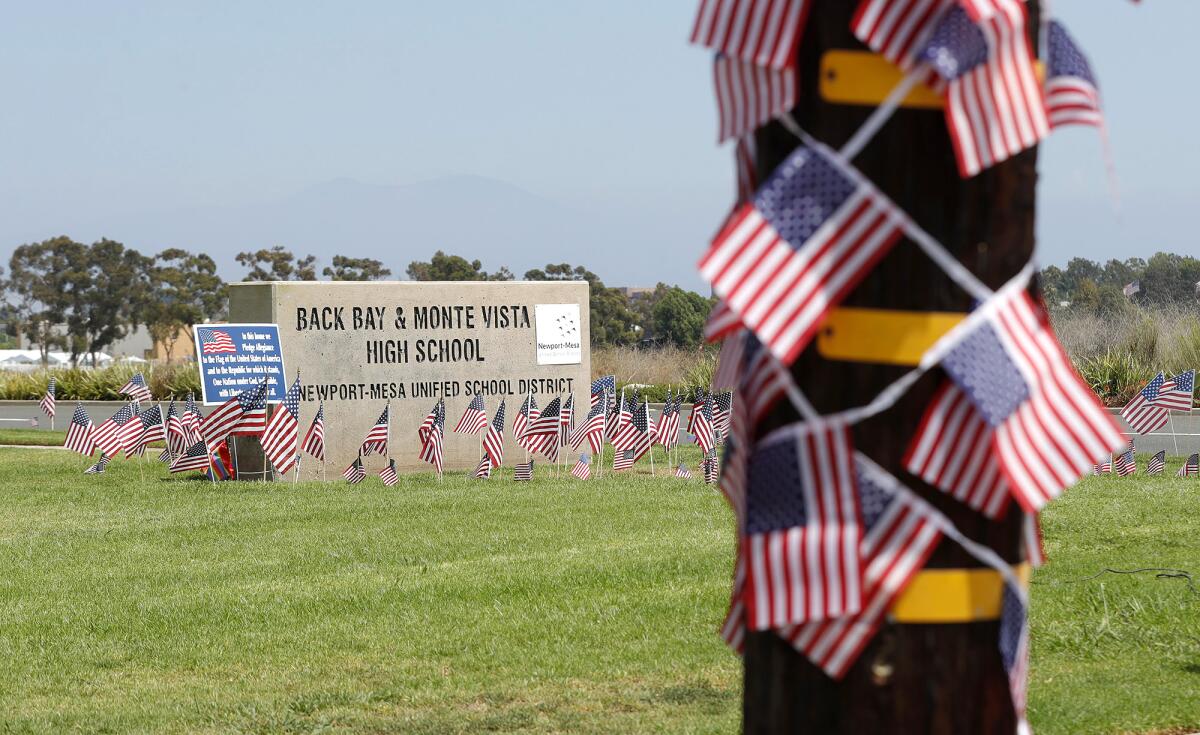 Small American flags are placed around the Back Bay and Monte Vista High School marquee.