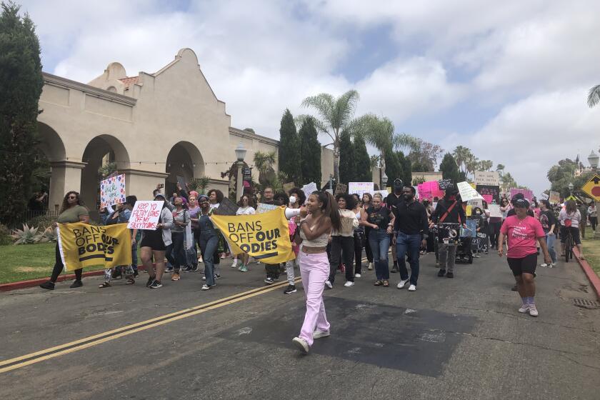 Protesters rallied in Balboa Park on Sunday in support of abortion rights.
