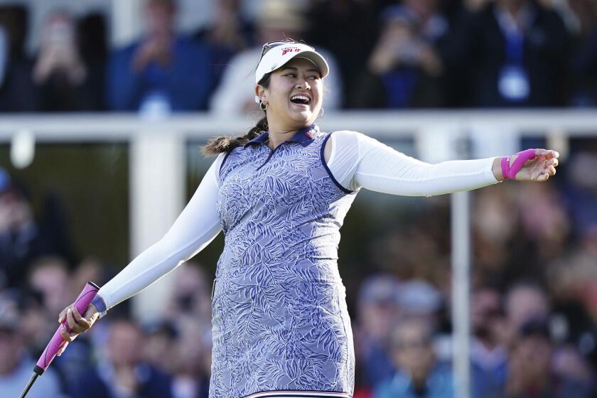los angeles bosch tour Lilia Vu of the US celebrates victory on the 18th green on day four of the 2023 AIG Women's Open at Walton Heath, in Surrey, England, Sunday Aug. 13, 2023. (John Walton/PA via AP)