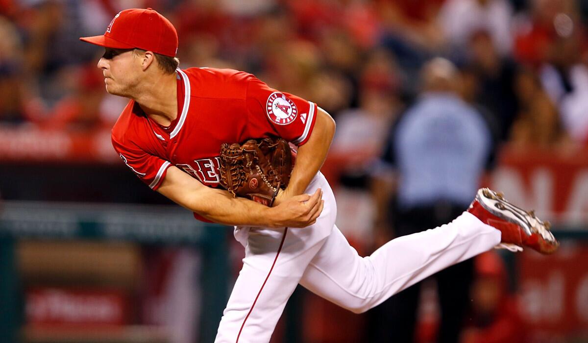 Angels' Trevor Gott pitches in the seventh inning against the Houston Astros on Monday.