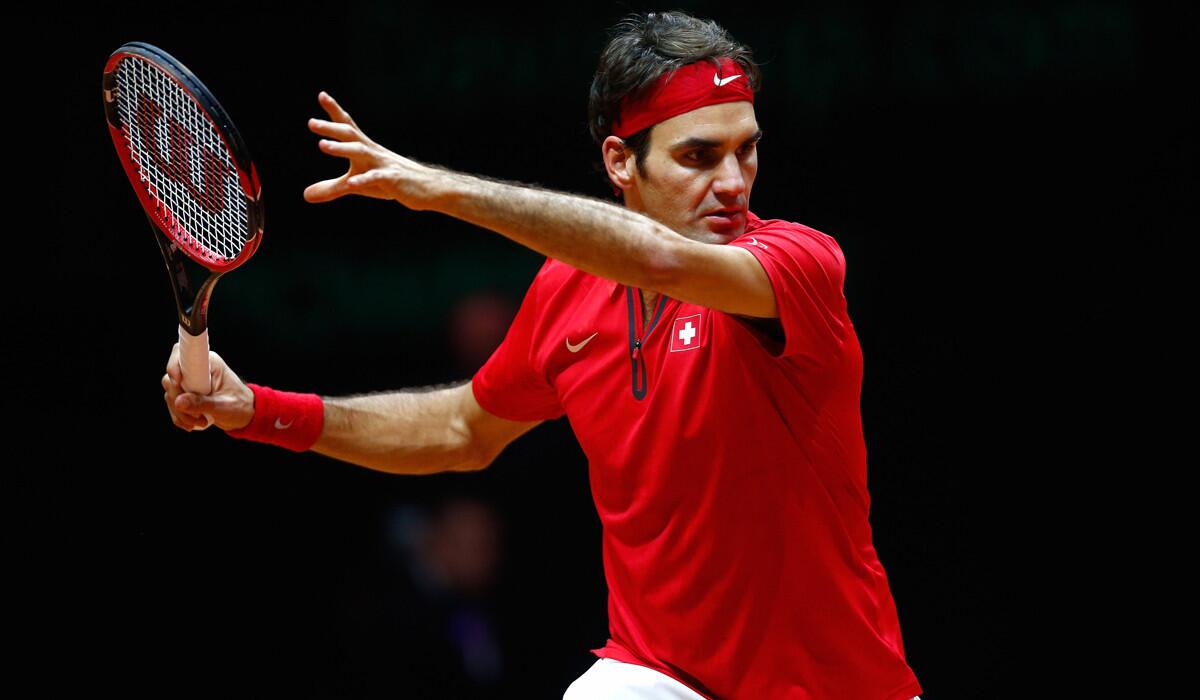 Roger Federer prepares to return a shot against Gael Monfils in their Davis Cup match on Friday.