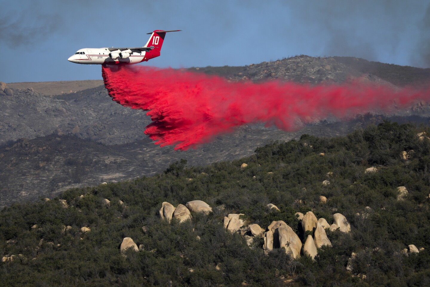 Fighting the Wildomar fire continues from air and ground near the affluent and exclusive community of La Cresta.