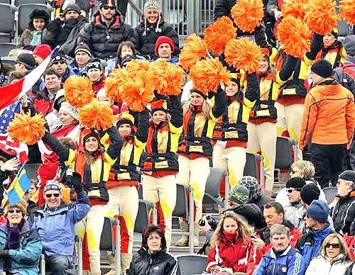 LETS GET LOUD: Cheerleaders rally the crowd at an Olympic venue. Their reviews are mixed.