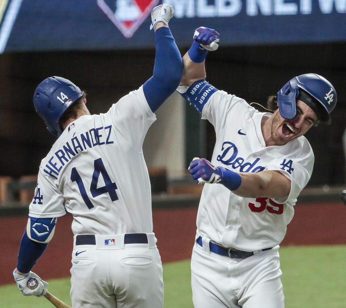 Dodgers center fielder Cody Bellinger celebrates after homering in the seventh inning in Game 7 of the NLCS.