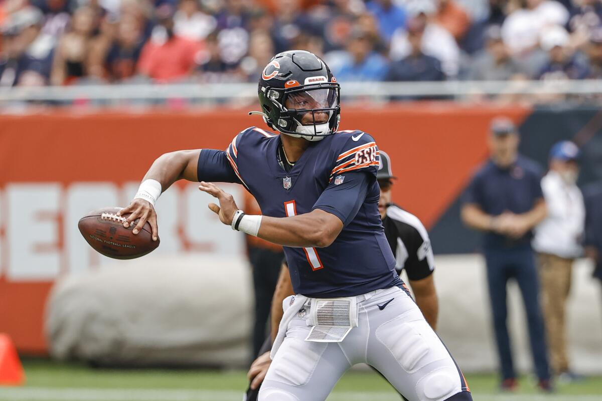 Chicago Bears quarterback Justin Fields passes against the Detroit Lions on Sunday.