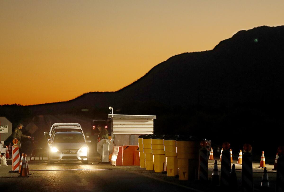 Drivers stop at a Border Patrol checkpoint on Arizona State Route 86 to the east of the Tohono O'odham Nation in southern Arizona.