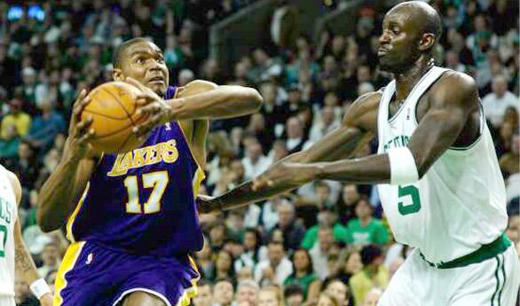 Lakers center Andrew Bynum drives around Celtics power forward Kevin Garnett in the first quarter Sunday afternoon.