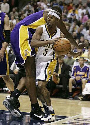 Andrew Bynum, T.J. Ford
