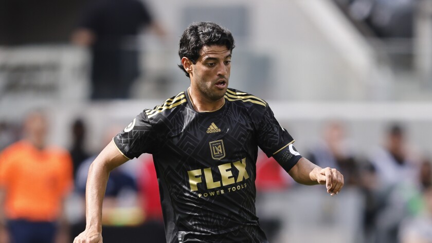 LAFC's Carlos Vela runs down the field during a game against the Colorado Rapids on Feb. 26, 2022.