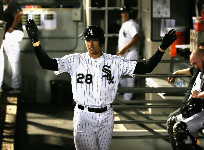 Outfielder Trayce Thompson gets the silent treatment in the White Sox dugout after hitting his first Major League home run on Aug. 11. He was traded to the Dodgers on Wednesday.