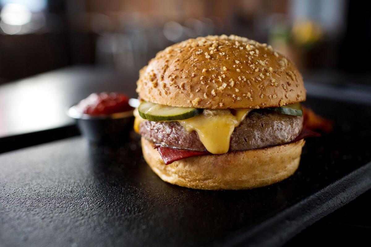 Plan Check is opening a location in Santa Monica. Pictured is the Plan Check burger made with ketchup leather.