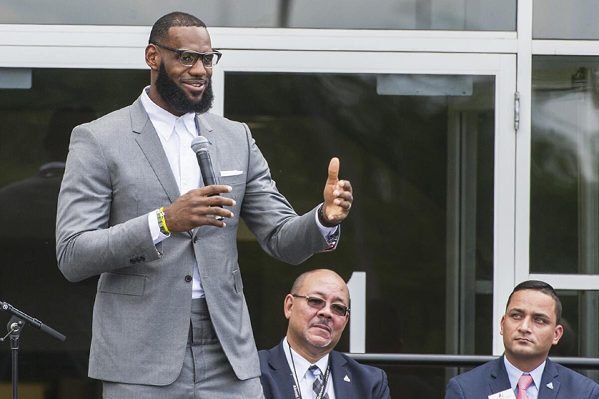 LeBron James speaking in Akron, Ohio, in 2008.