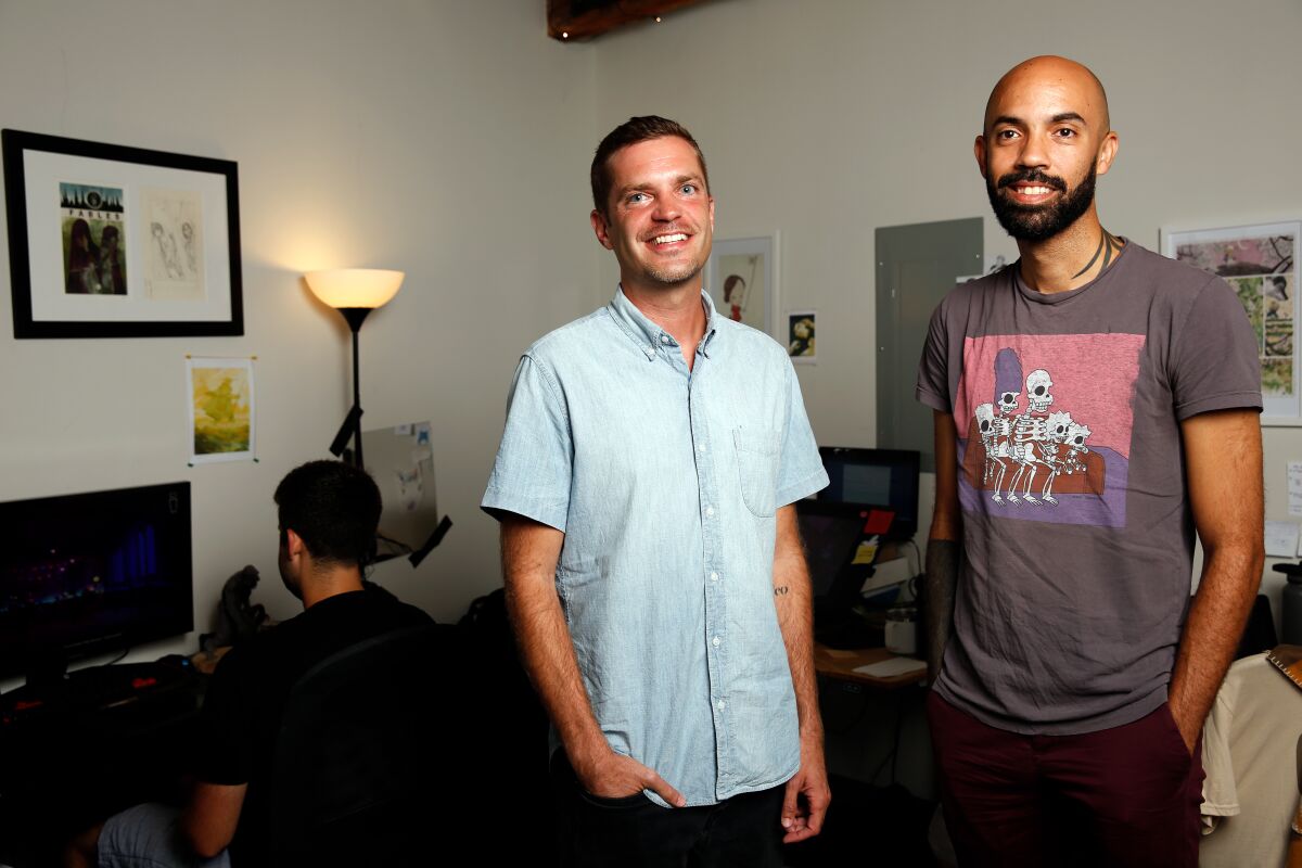 “Post-'Oxenfree,’ we thought, ‘Why not do some crazy world-building?’” said Sean Krankel, right, with Adam Hines.