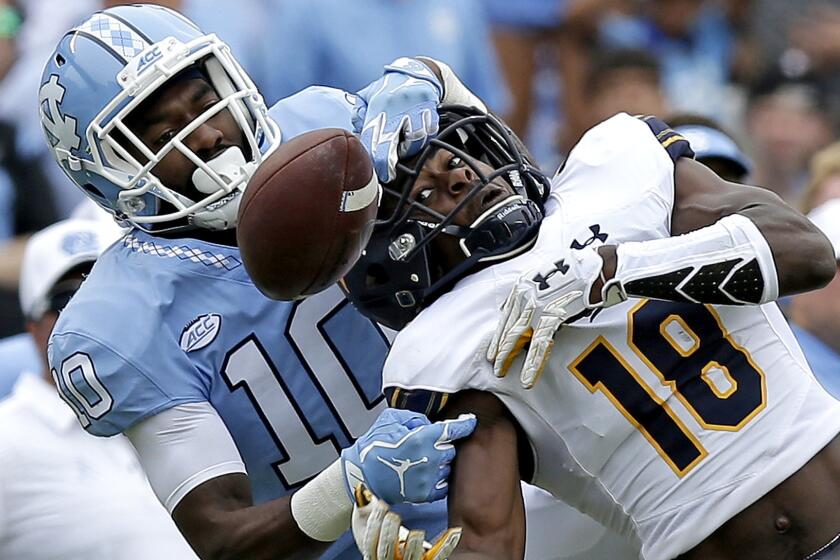 North Carolina's Andre Smith (10) breaks up a pass intended for California's Marloshawn Franklin Jr. (18) during the first half of an NCAA college football game in Chapel Hill, N.C., Saturday, Sept. 2, 2017. (AP Photo/Gerry Broome)