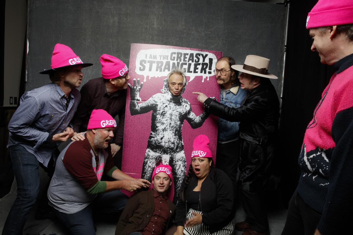 The cast, producers writers and director from the film "The Greasy Strangler."