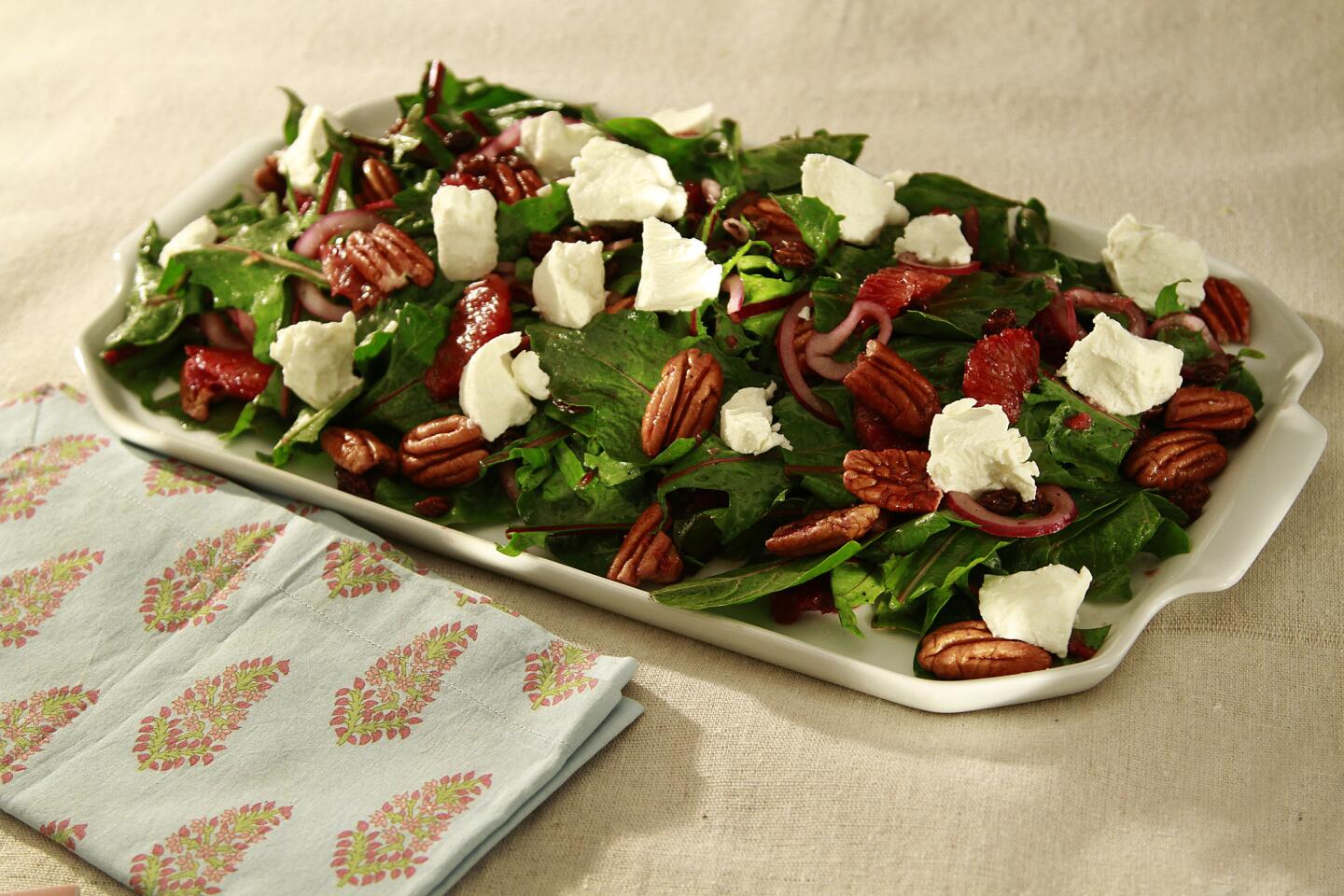 Salad of dandelion greens, blood oranges, goat cheese and pecans