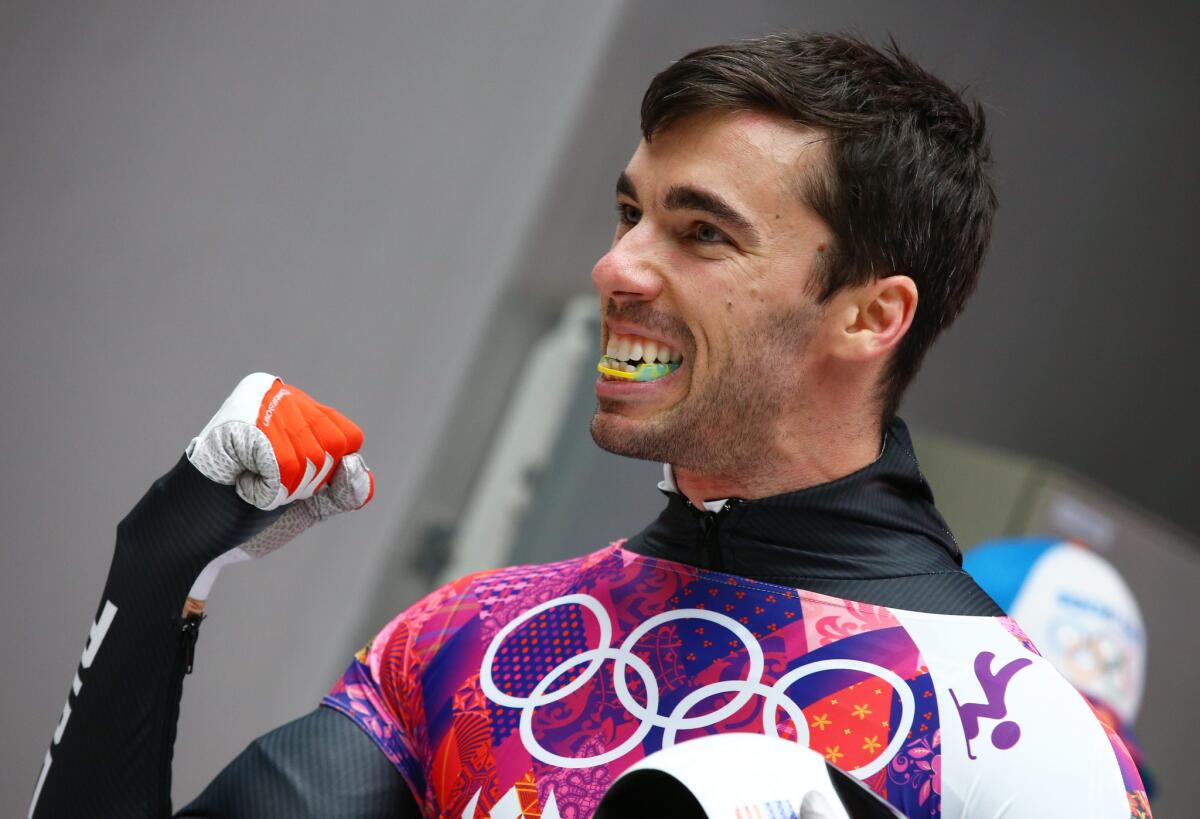 U.S. skeleton racer Matthew Antoine celebrates in Sochi. Though his family joined him in the Winter Games, he made sure to set ground rules to limit distractions: "I told them to leave me out of the program as much as possible so I can focus on what I need to do." He went on to win the bronze medal.