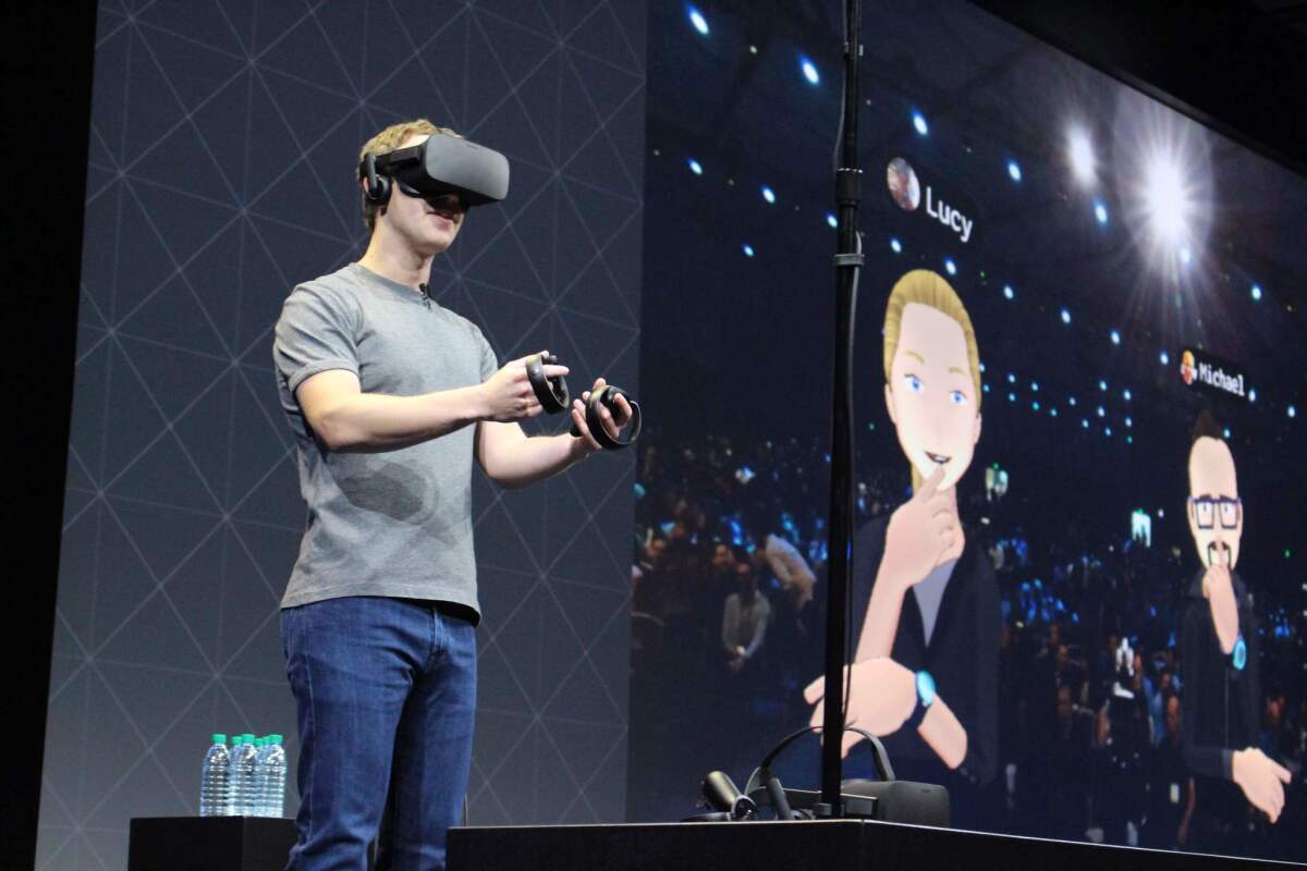 Facebook CEO Mark Zuckerberg speaks at an Oculus developers conference in San Jose while wearing a virtual reality headset in October.