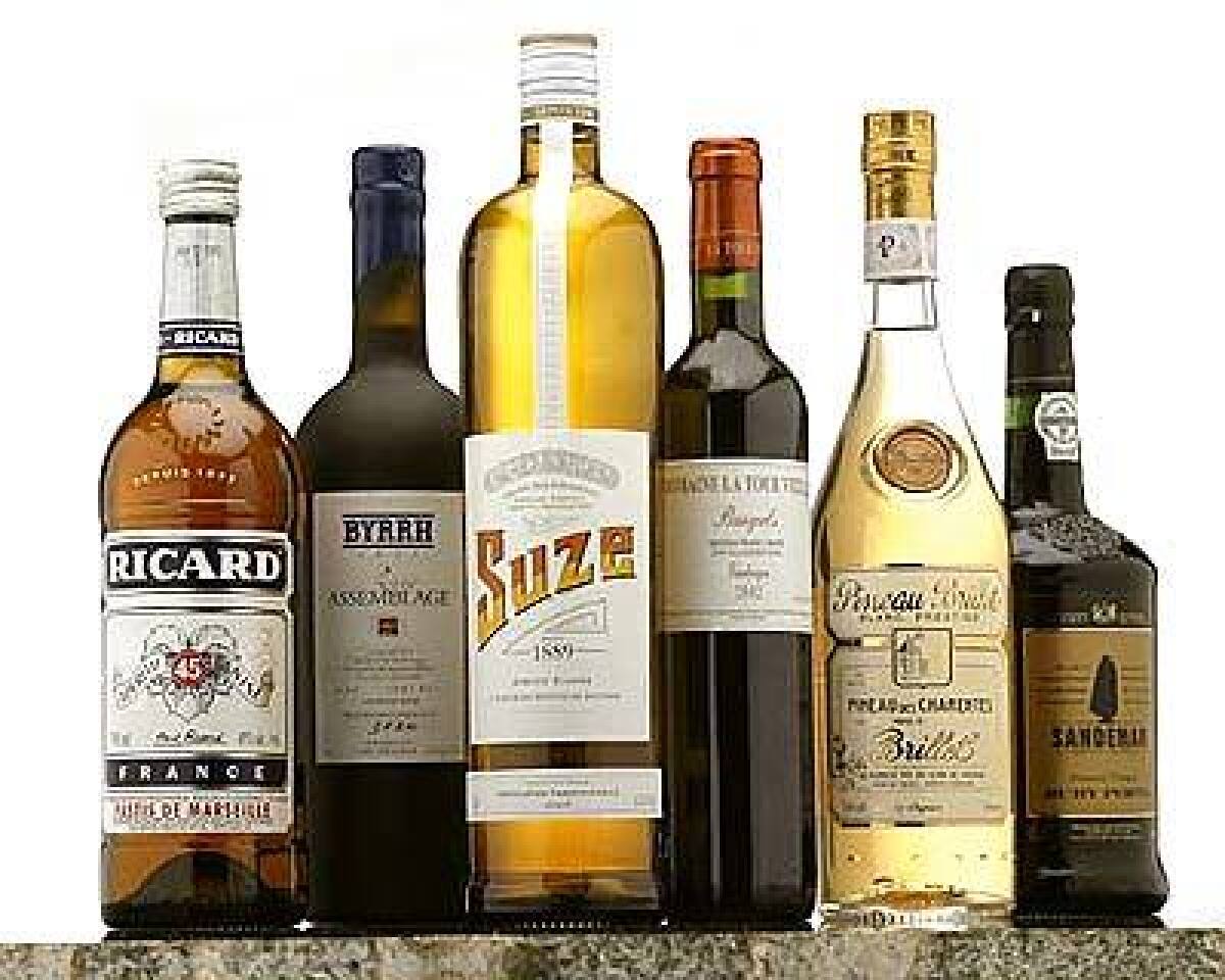French aperitifs offer something bitter to arouse the appetite and something sweet to offset the bitterness. Favorites include, from left, anise-flavored pastis; Byrrh with its hint of quinine; the bitter Suze; sweet Banyuls; refreshing Pineau des Charentes; and Port.