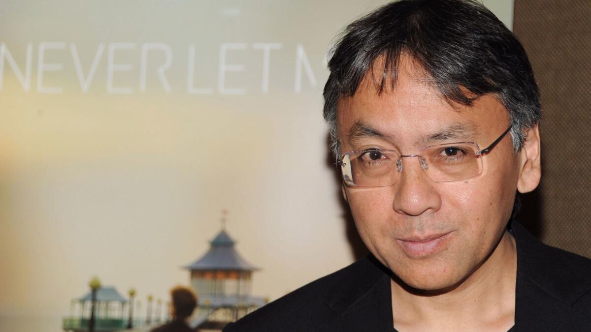 Kazuo Ishiguro attends a screening of the adaptation of "Never Let Me Go." The 2010 film starred Keira Knightley, Carey Mulligan and Andrew Garfield.