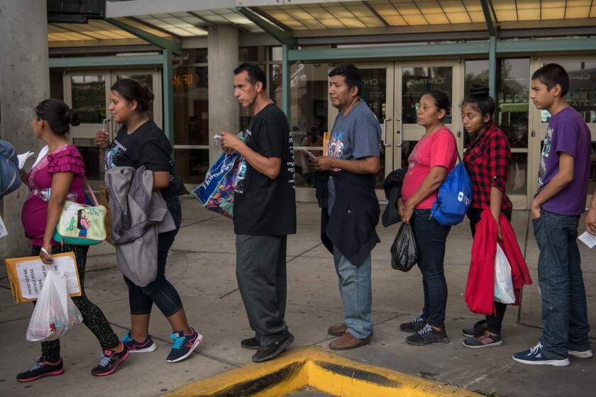 Central American migrant families recently released from federal detention wait to board a bus at a bus depot in McAllen, Texas on June 11, 2019. (Photo by Loren ELLIOTT / AFP)LOREN ELLIOTT/AFP/Getty Images ** OUTS - ELSENT, FPG, CM - OUTS * NM, PH, VA if sourced by CT, LA or MoD **