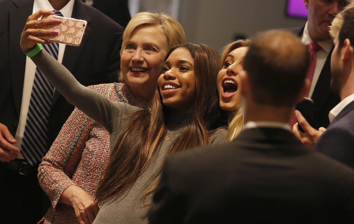 The Democratic presidential candidate takes a selfie with fans Tuesday evening in Hollywood.