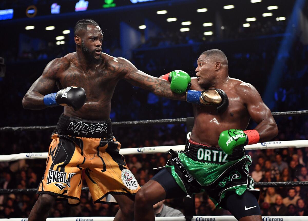 Heavyweight champion Deontay Wilder of the US fights contender Luis Ortiz of Cuba during their WBC heavyweight title fight in New York on March 3, 2018. / AFP PHOTO / Timothy A. CLARYTIMOTHY A. CLARY/AFP/Getty Images