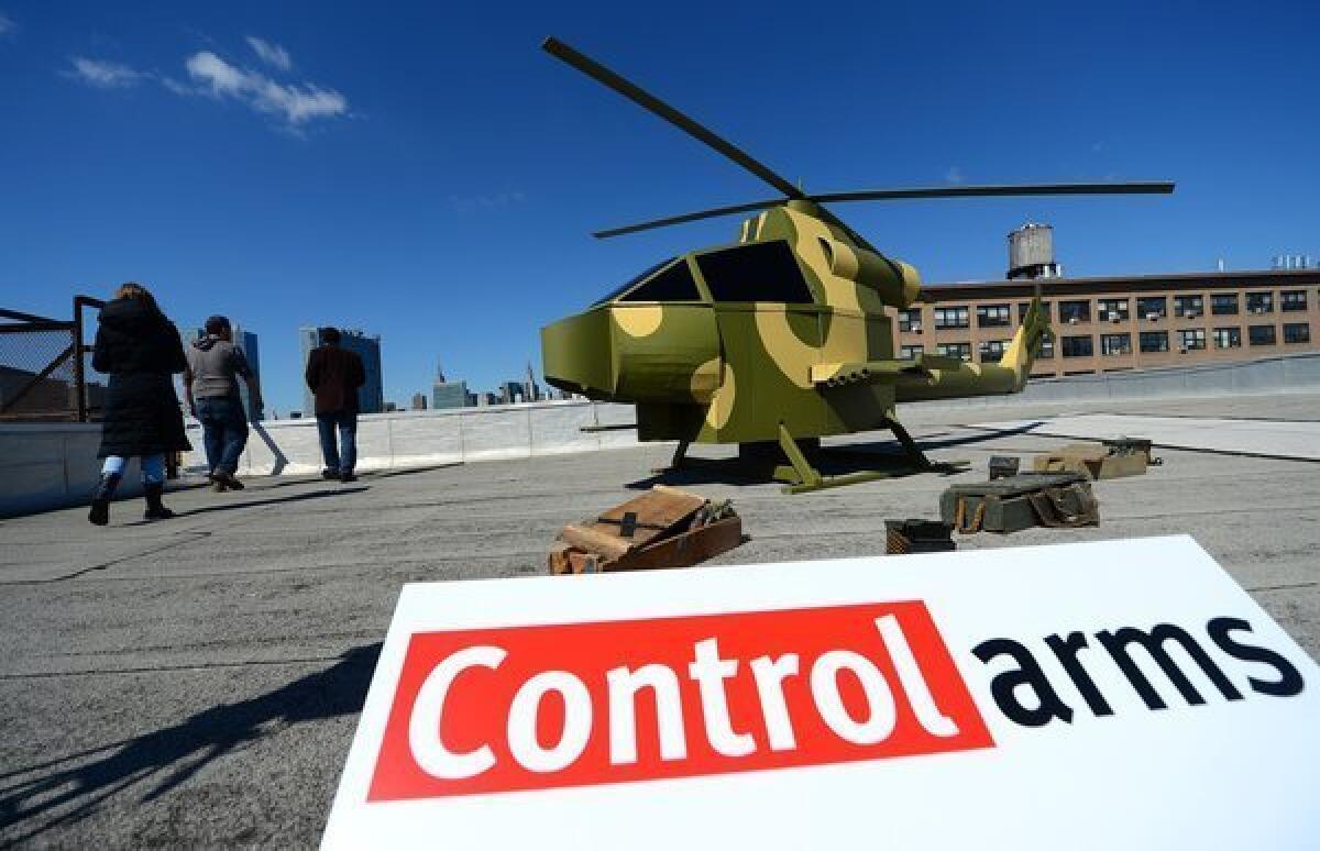 A mock military helicopter sits on a New York rooftop during a campaign by activists with the Control Arms Coalition.