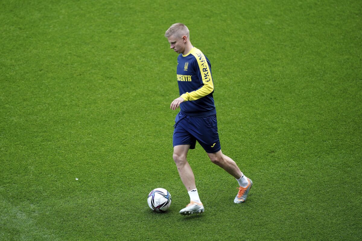 Ukraine's Oleksandr Zinchenko controls the ball during a training session at the Cardiff City Stadium, Cardiff, Wales Saturday June 4, 2022, the day before the team play Wales in a World Cup play-off soccer match. (Mike Egerton/PA via AP)