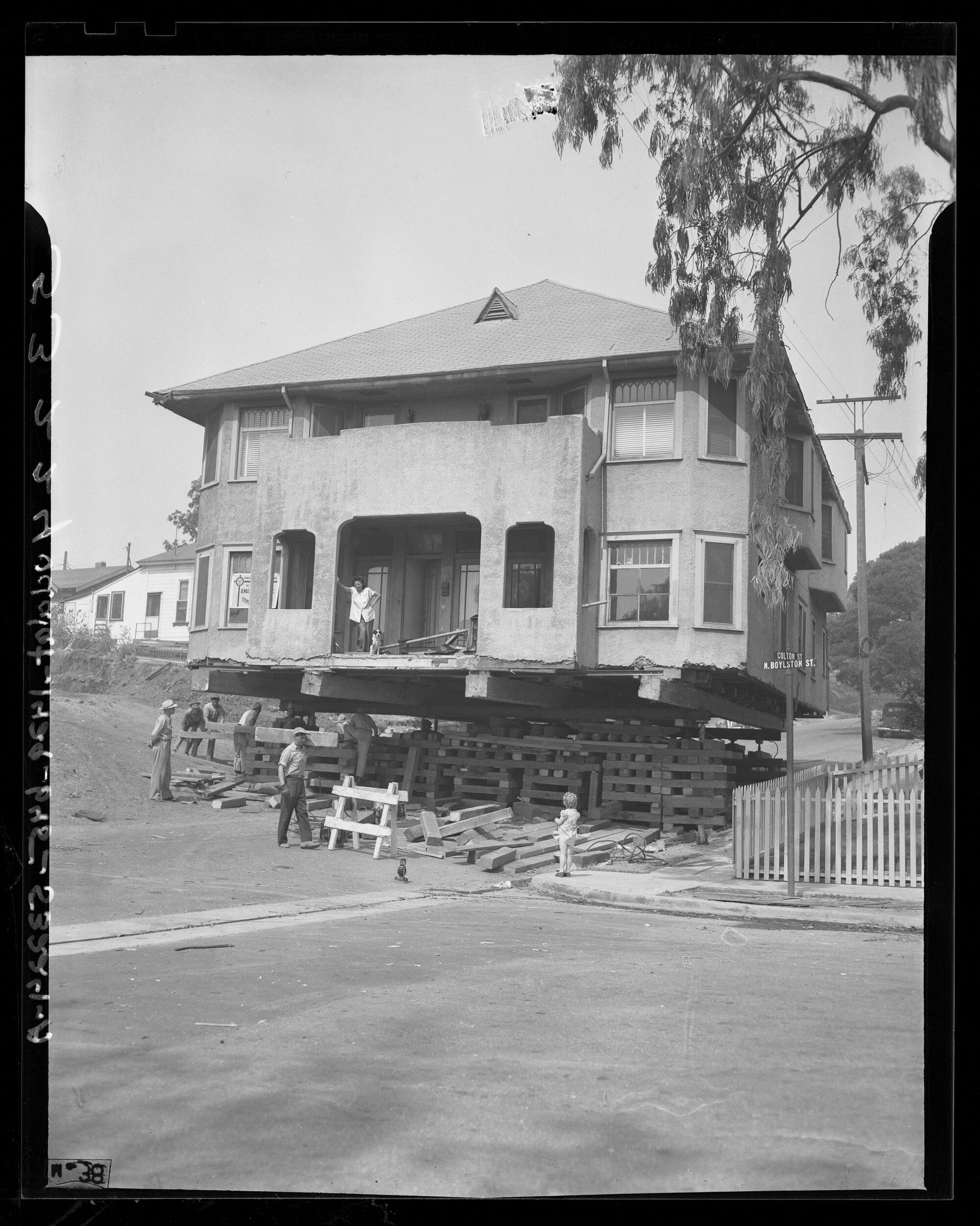 A house inhabited by a family is moved to make way for a freeway on Aug. 20, 1948.
