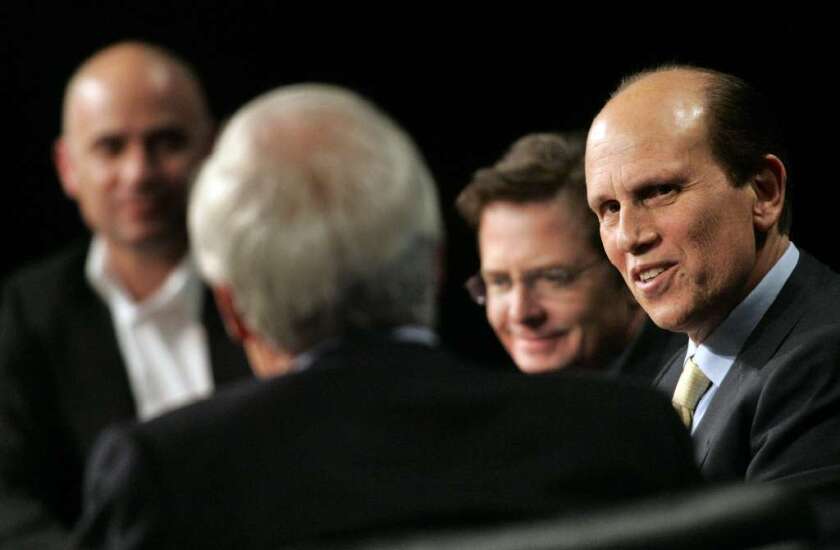 Big wheels in philanthropy, but are they conservatives or liberals? From left, Andre Agassi, Ted Turner, Michael J. Fox and Michael Milken at a 2007 Milken Institute discussion of public figure philanthropy.