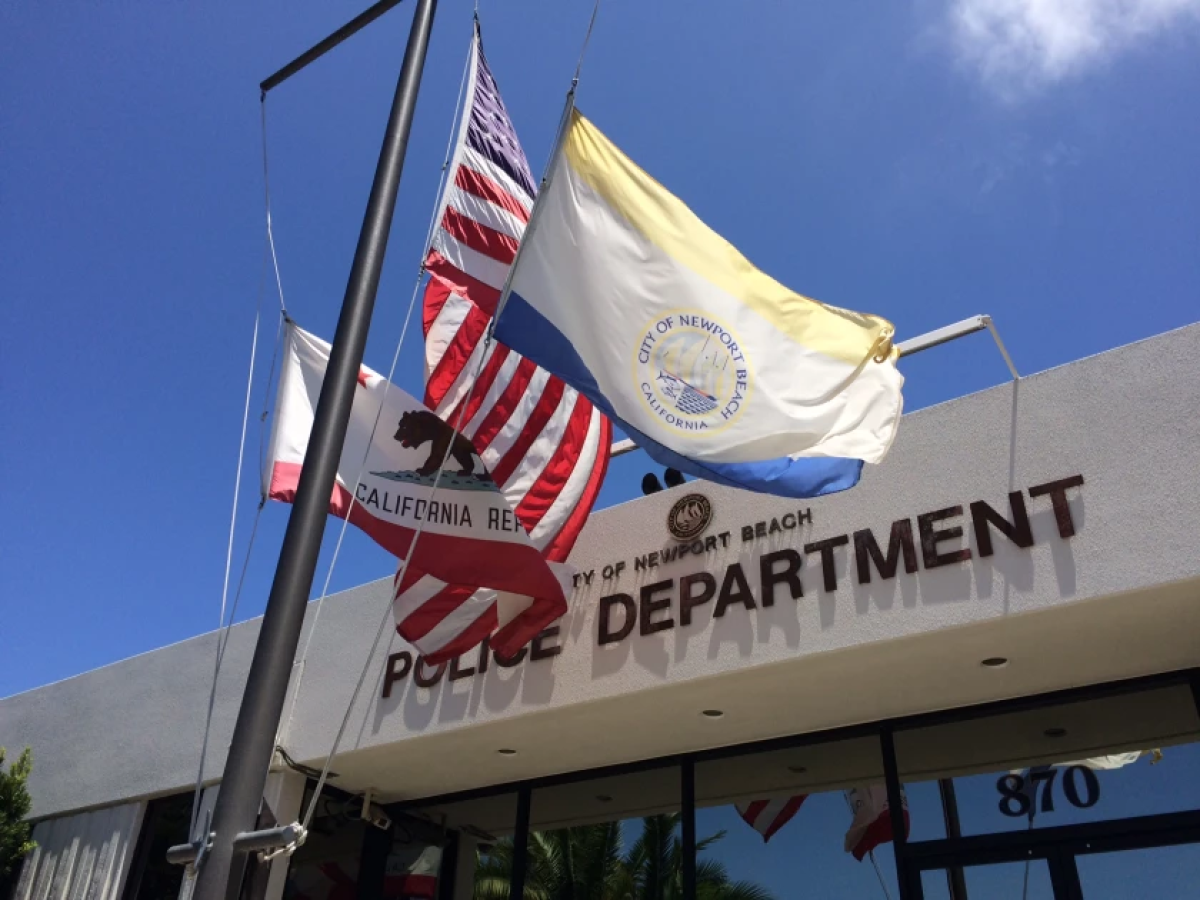 Flags outside the Newport Beach Police Department